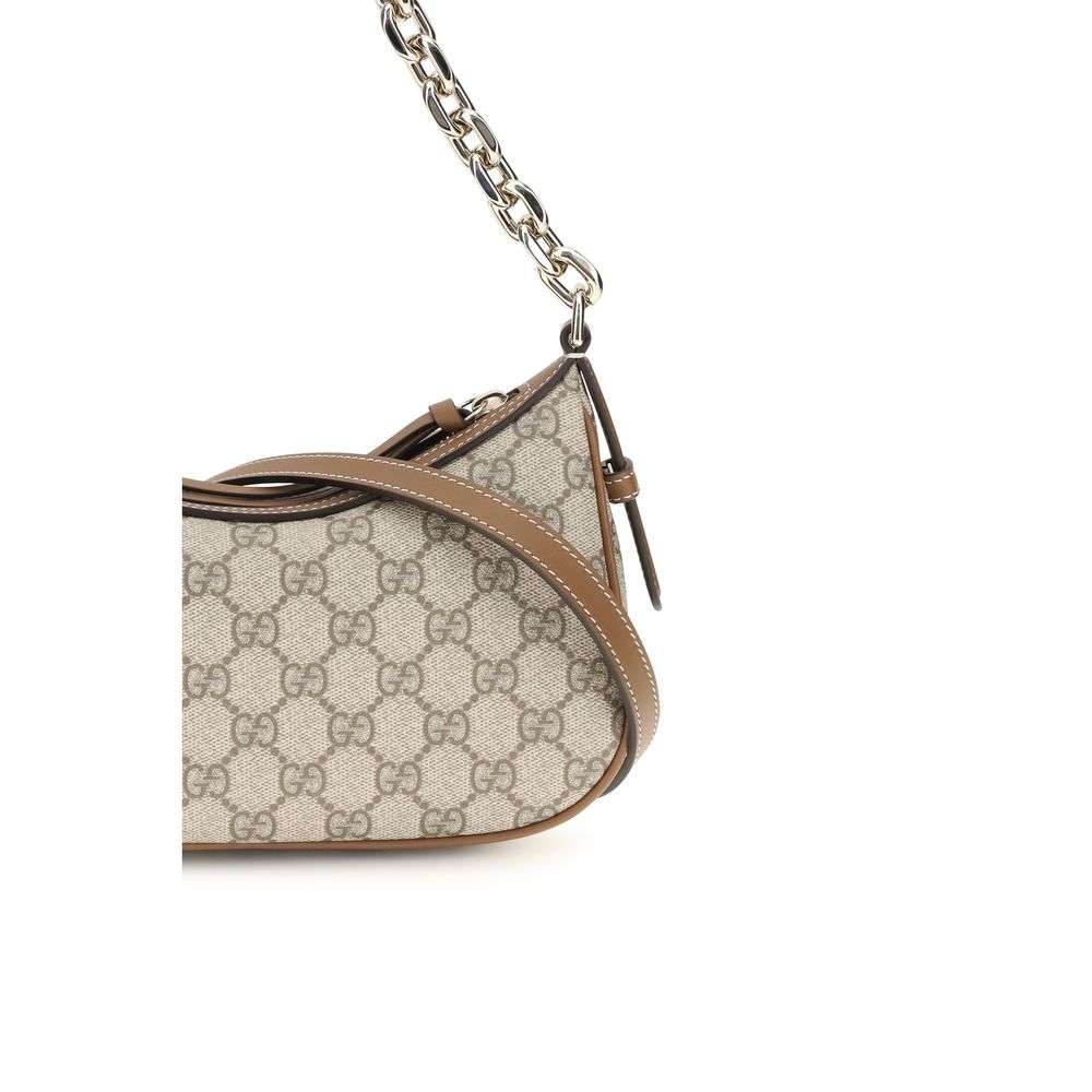 Bolso al hombro GG Emblem pequeño en tejido