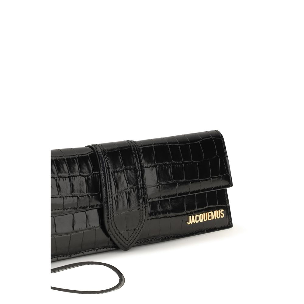 El clutch Bambino en piel de becerro grabada con efecto cocodrilo