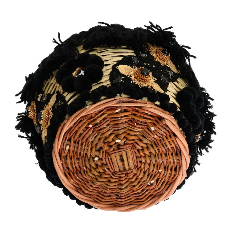 Sac seau chic en peau de serpent beige et noir