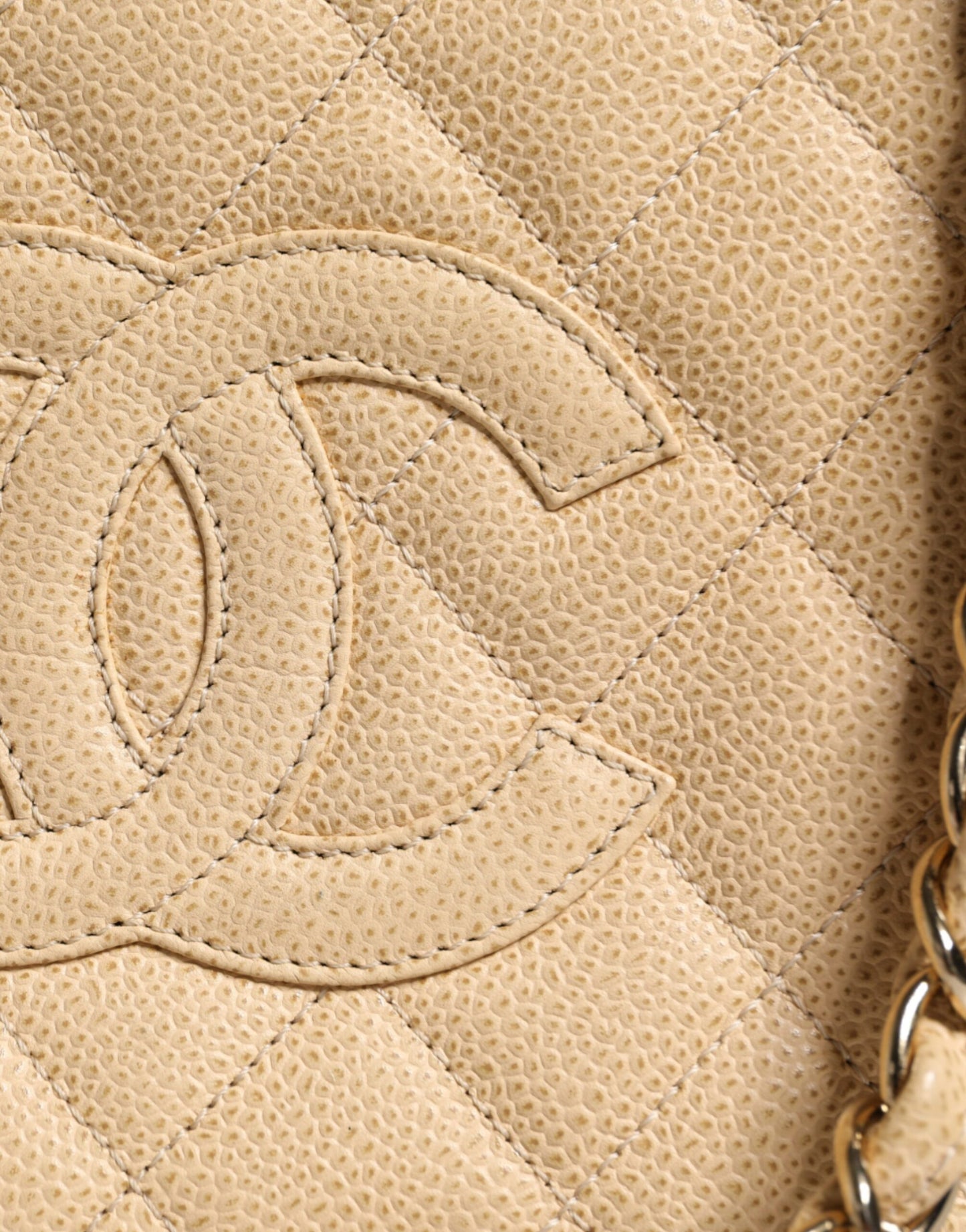 Sac à main en cuir beige avec chaîne Caviar De Coco