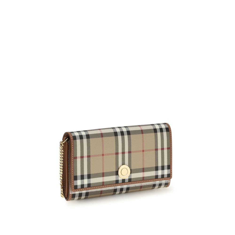Cartera con cadena y diseño a cuadros