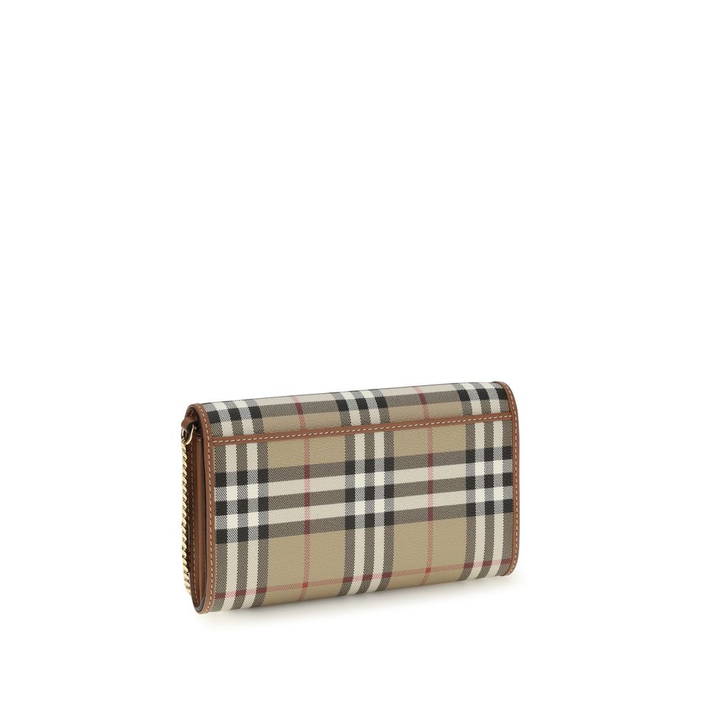 Cartera con cadena y diseño a cuadros