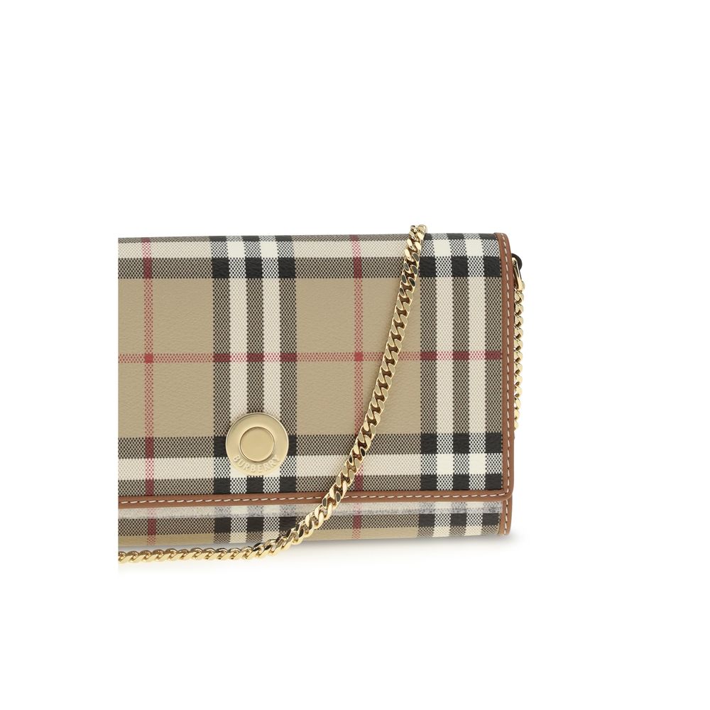 Cartera con cadena y diseño a cuadros