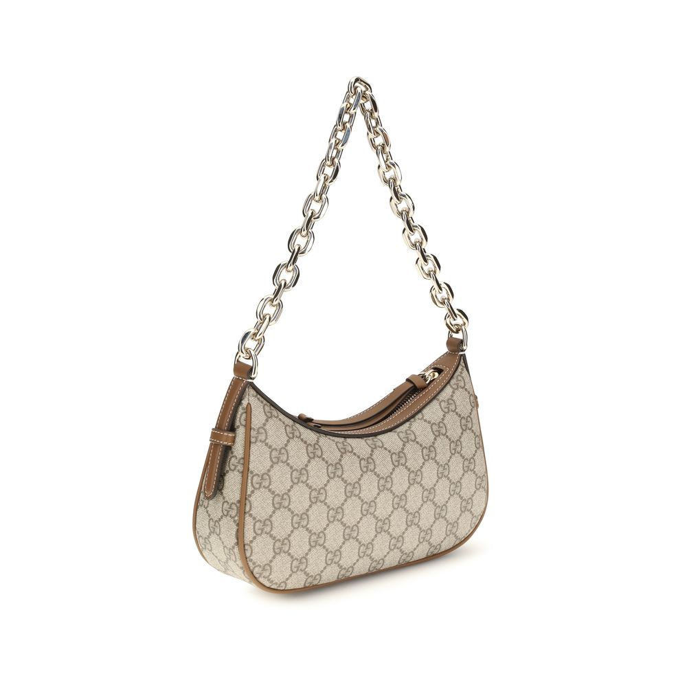 Bolso al hombro GG Emblem pequeño en tejido