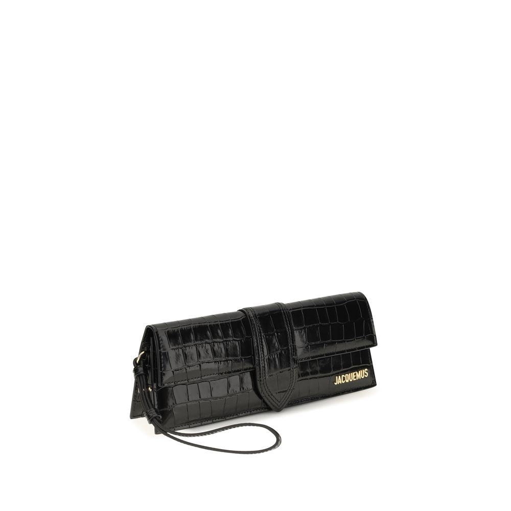 El clutch Bambino en piel de becerro grabada con efecto cocodrilo
