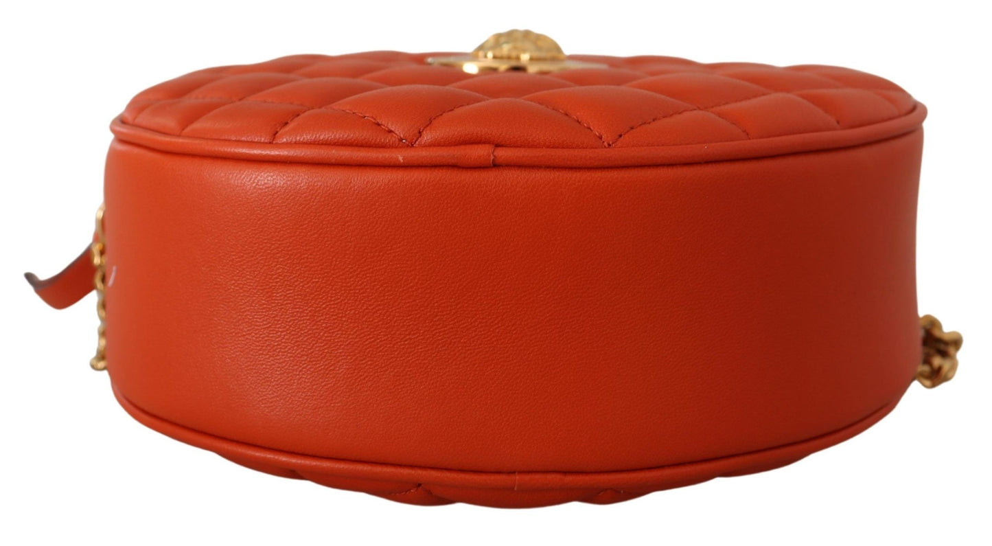 Elegante bolso bandolera redondo de piel napa