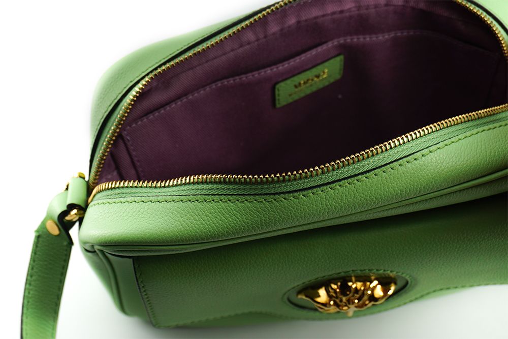 Elegante bolso de cuero verde menta para cámara