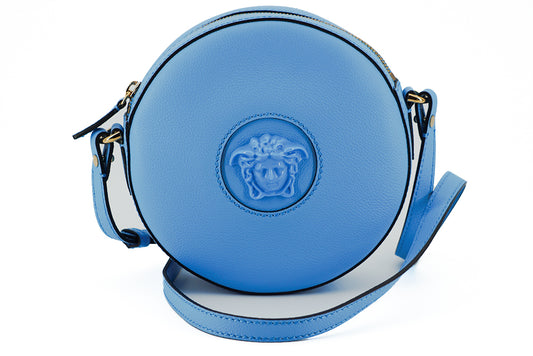 Elegante bolso de hombro redondo de cuero azul