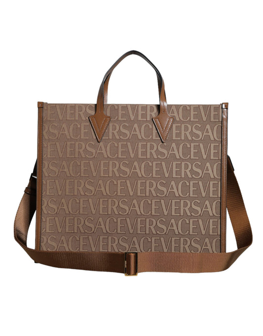 Bolso bandolera marrón con asa superior de piel jacquard y logotipo